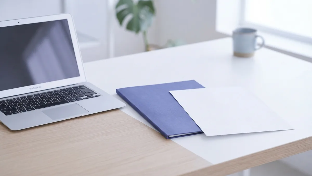 Laptop with folder and paper document showing two neat file management choices