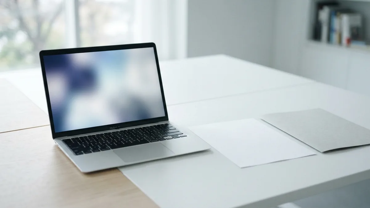 PDF files can store font data Laptop and blank document representing font data embedded in a PDF