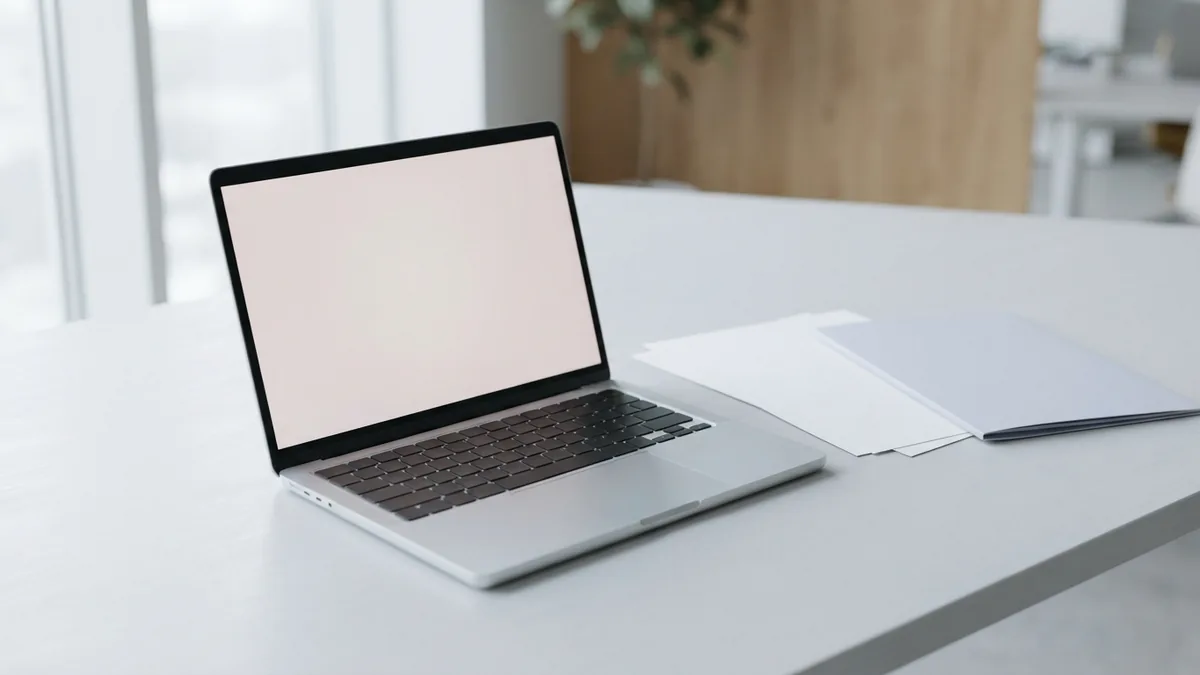 A laptop and blank document pages represent choosing a PDF conversion method